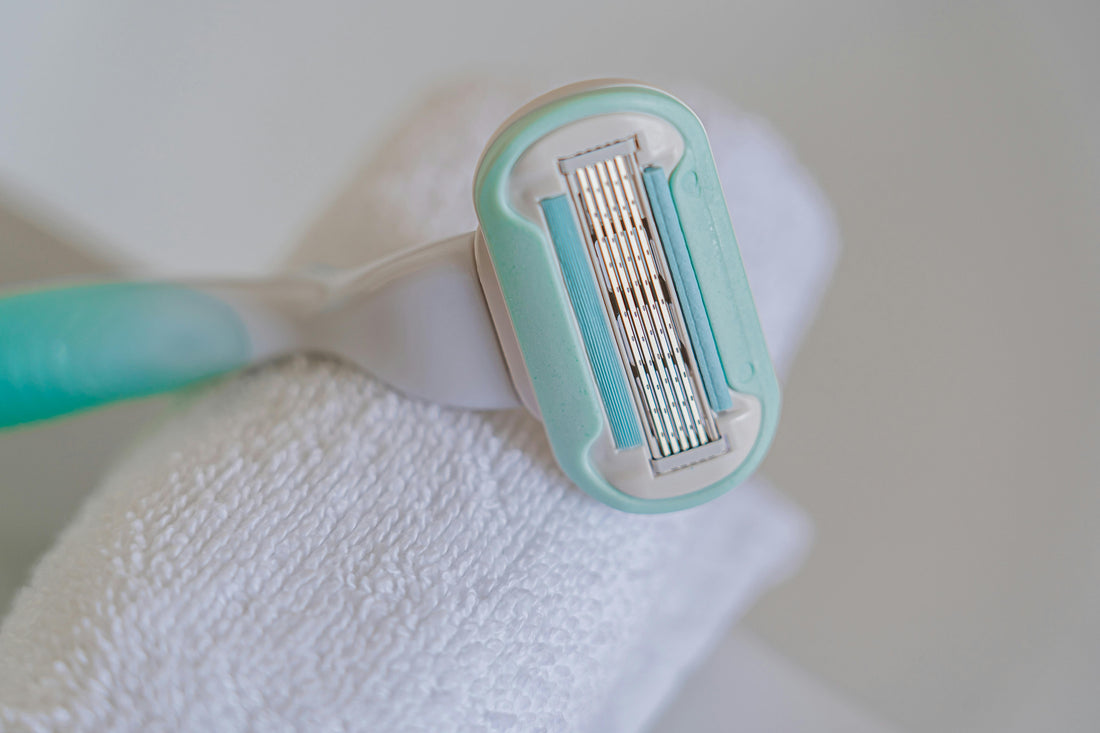 image of a towel and razor blades