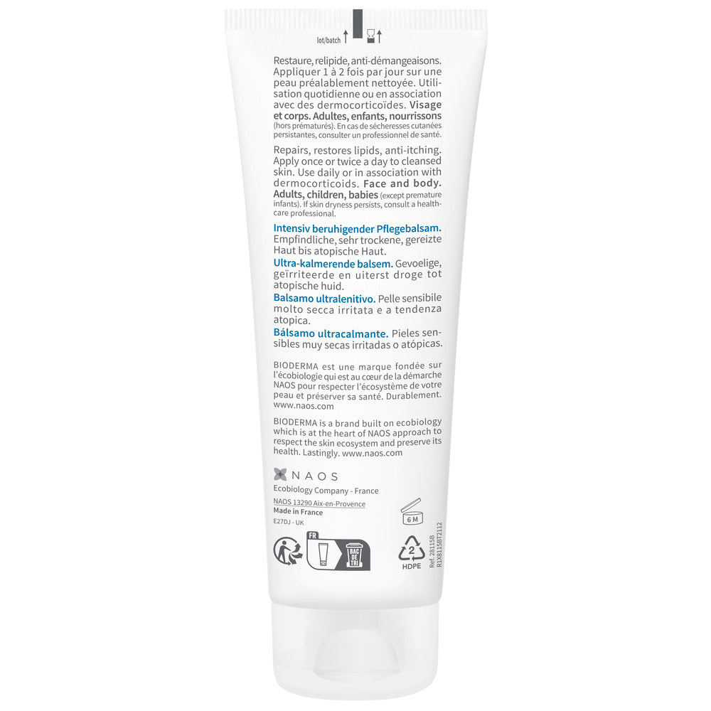 Back label of a skincare product container with text and icons on a white background