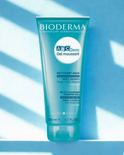 Bioderma ABCDerm Gel moussant tube on a blue background