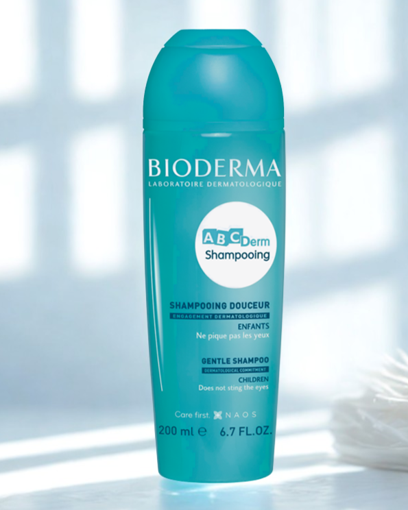 Bioderma ABCDerm Shampoo bottle on a light background