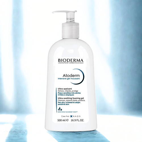 Bioderma Atoderm bottle on a blue gradient background