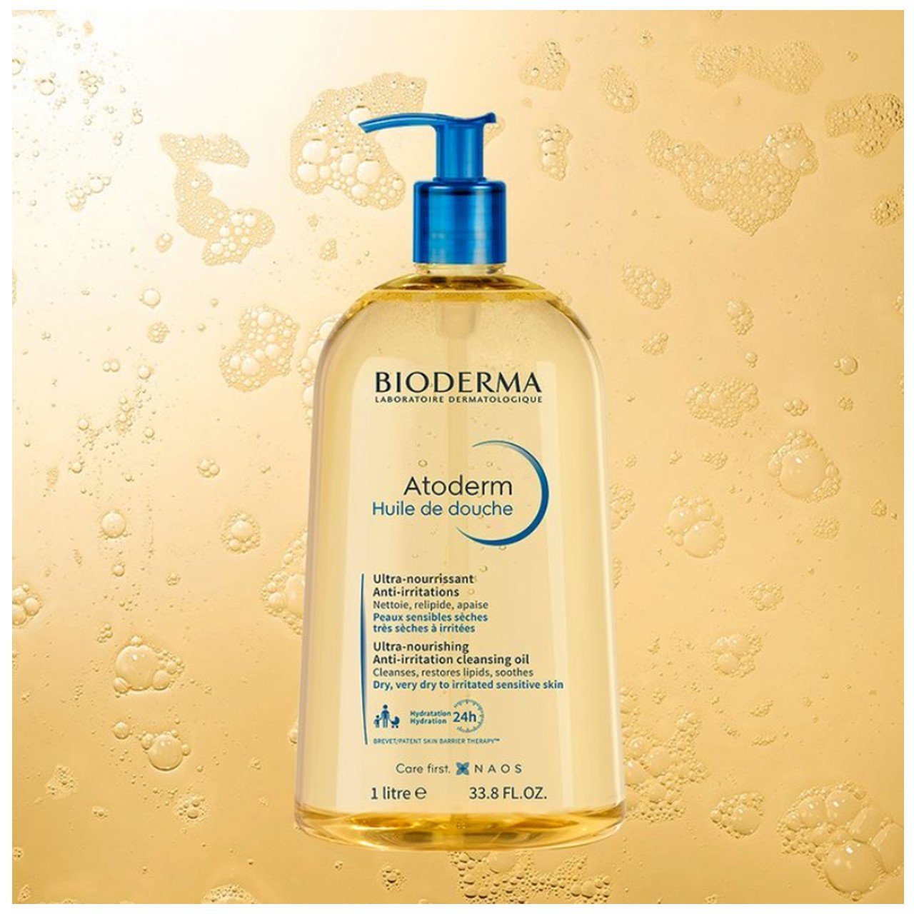 Bioderma Atoderm shower oil bottle with pump on a yellow background