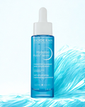 Bioderma Hydrabio Hyalu serum bottle on a white background with blue water effect