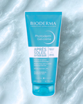 Bioderma Photoderm After-Sun Gel-Creme tube on a textured white background