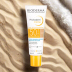 Bioderma_Photoderm_Cr_me_sunscreen_tube_on_sand