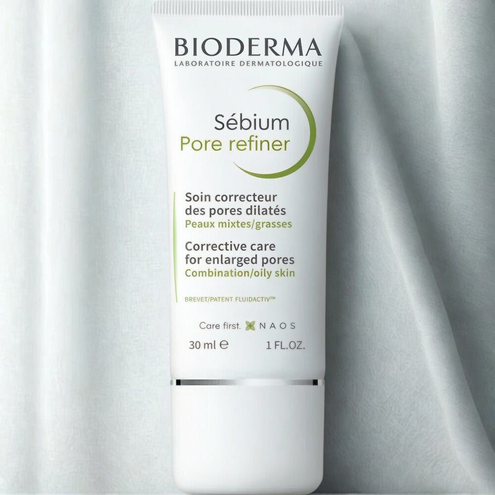 Bioderma Sébium Pore Refiner tube on a gray background