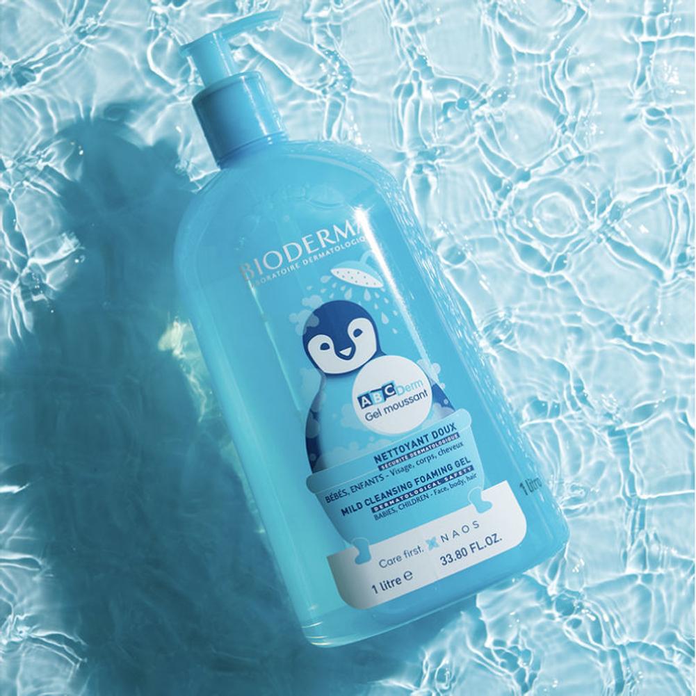 Bioderma bottle with a penguin label on a water background