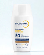 Bioderma sunscreen bottle on a light blue background