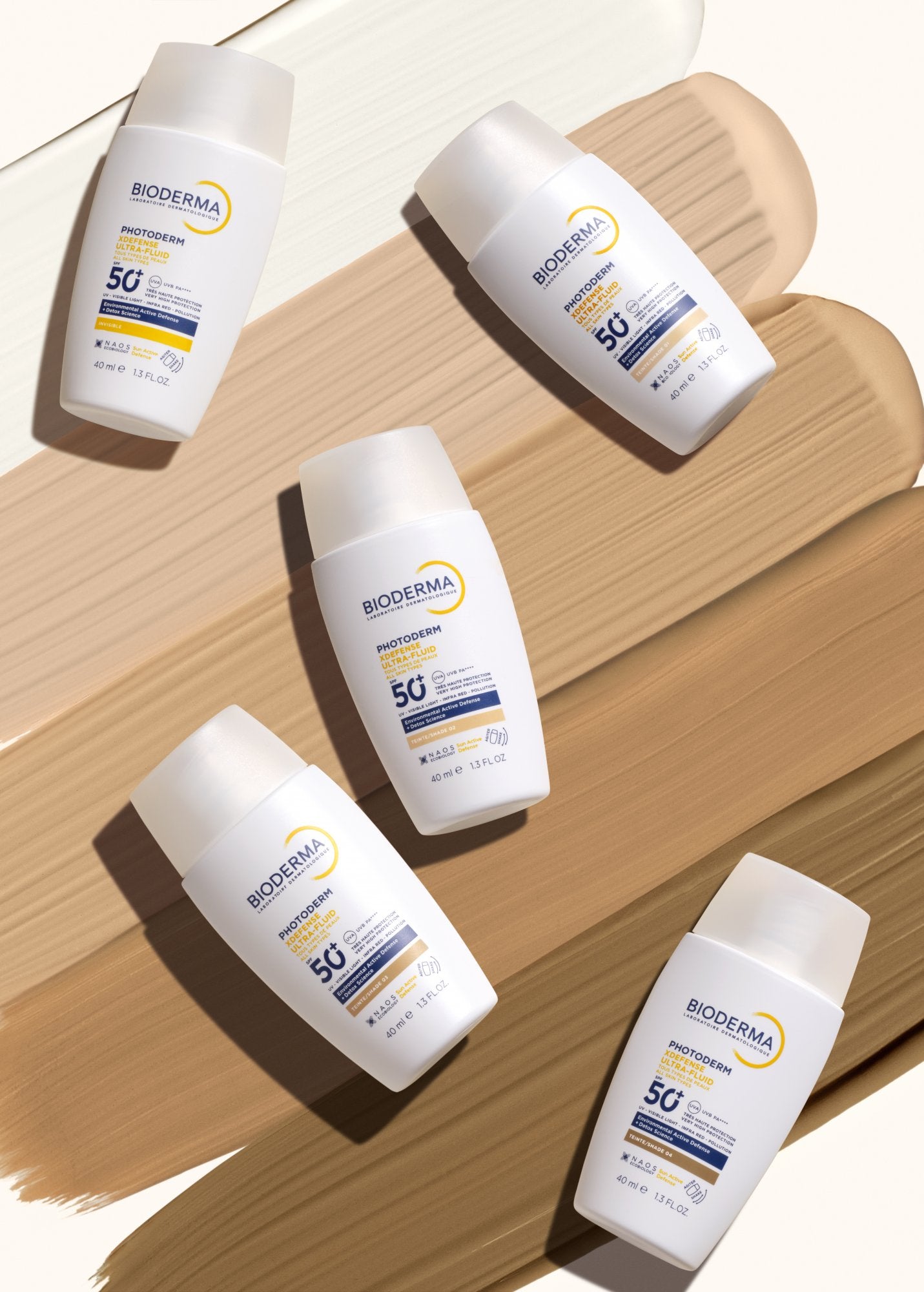 Bioderma sunscreen bottles on a wooden surface
