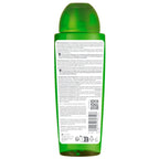 Green bottle with label on a white background