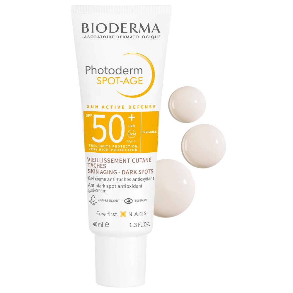 Bioderma Photoderm Spot-Age sunscreen tube with capsules on a white background