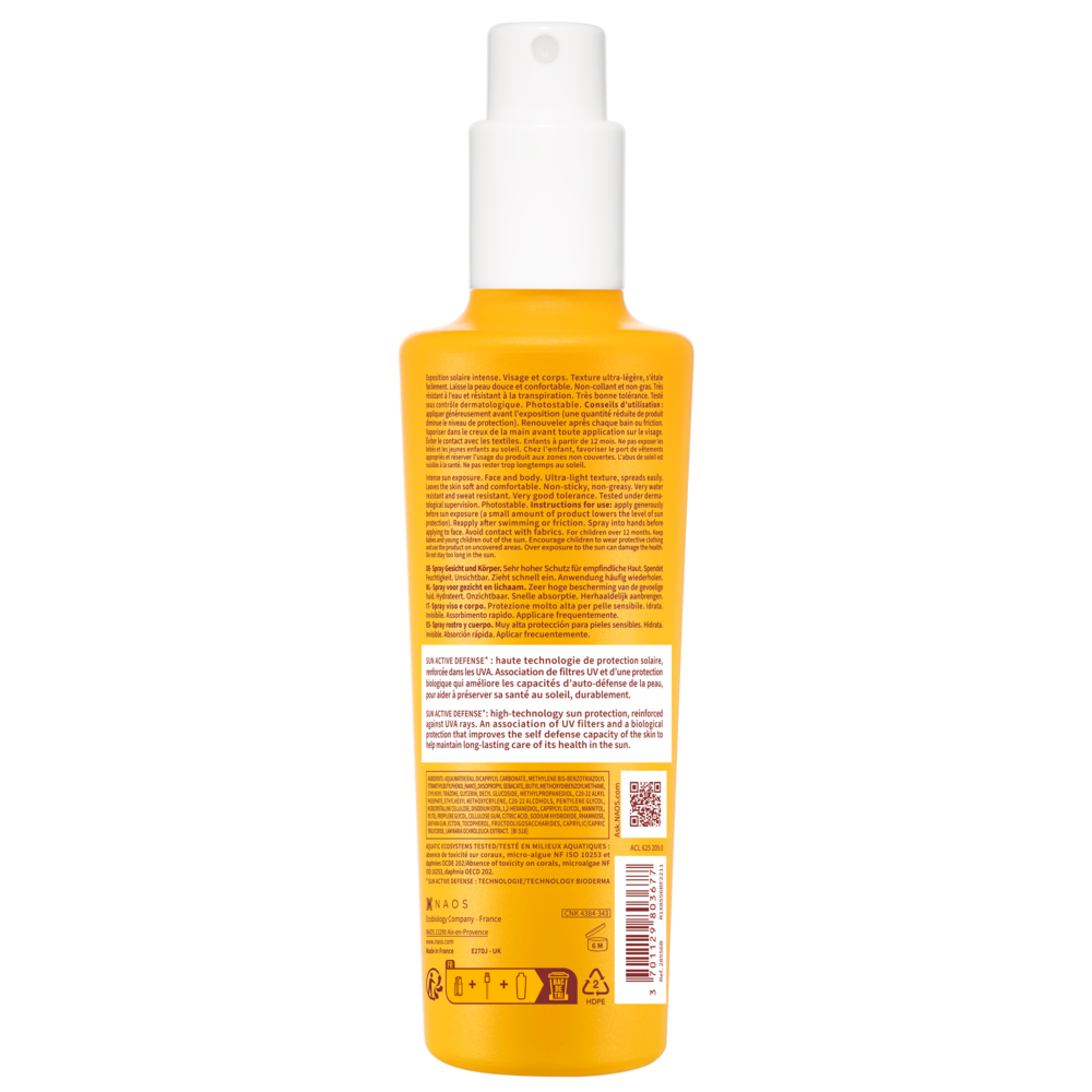 Yellow bottle with white cap on a white background