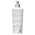 Back view of a white bottle with text and a QR code on a white background