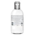 Clear bottle with a silver cap on a white background