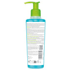 Blue bottle with green pump on a white background