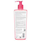 Pink bottle with pump dispenser on a white background