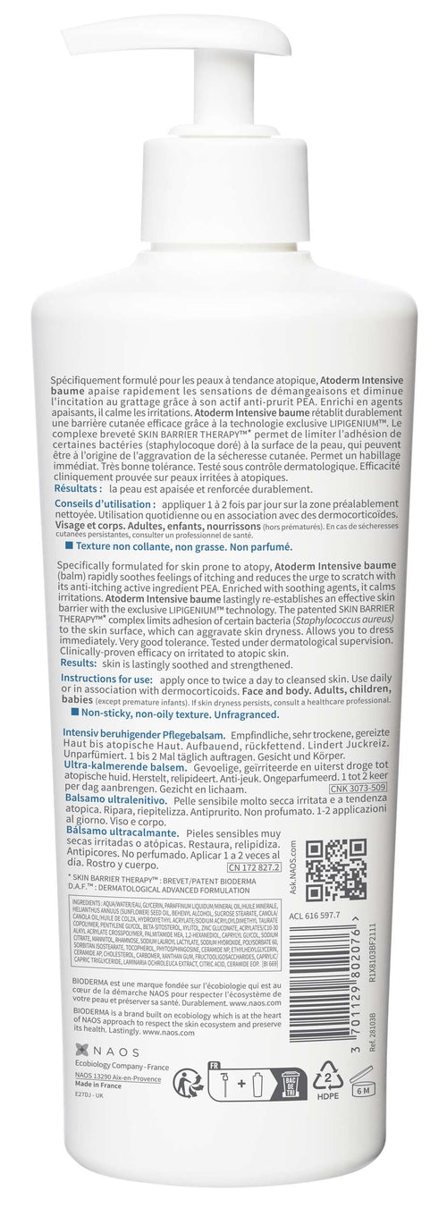 White bottle with pump and label on a white background