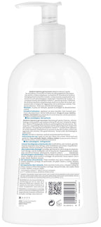 White bottle with pump and text on a white background